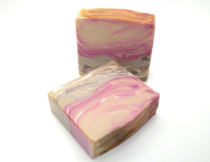 Handcrafted Cashmere soap bars in pink, cream, and taupe swirls